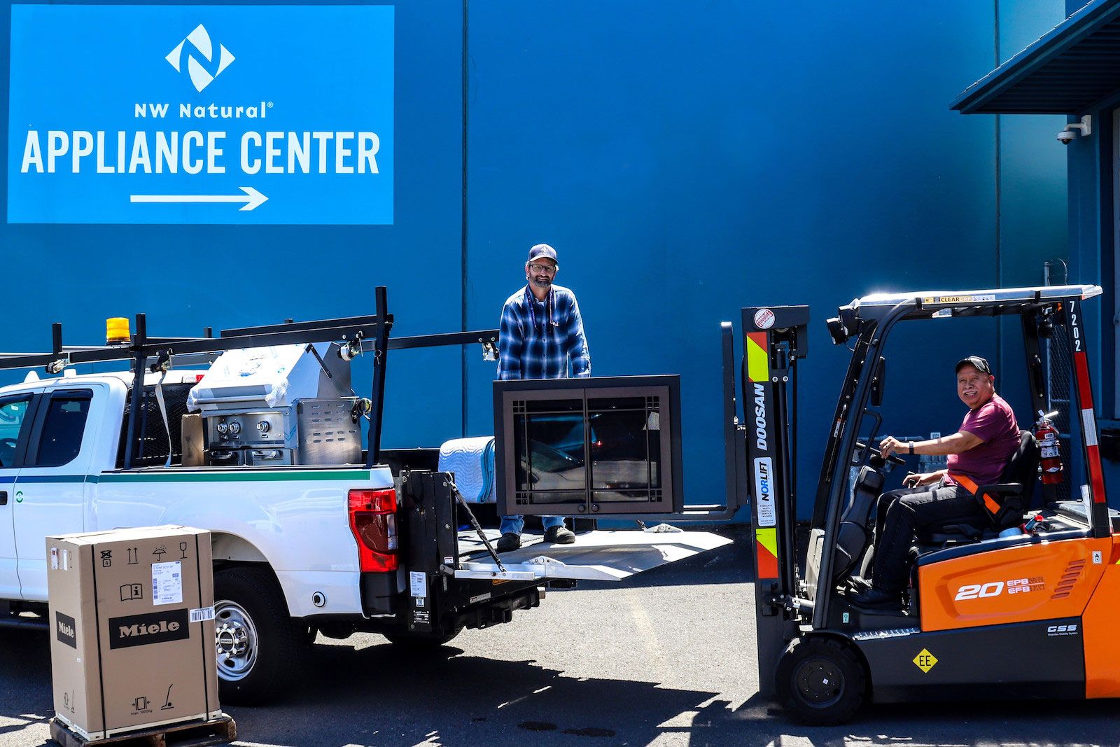 staff moving fireplace northwest natural appliance center